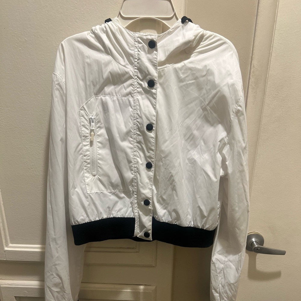 White medium zip up hoodie with black trim